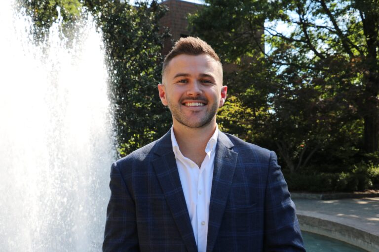 Brennen Sanders in front of Herty Fountain.